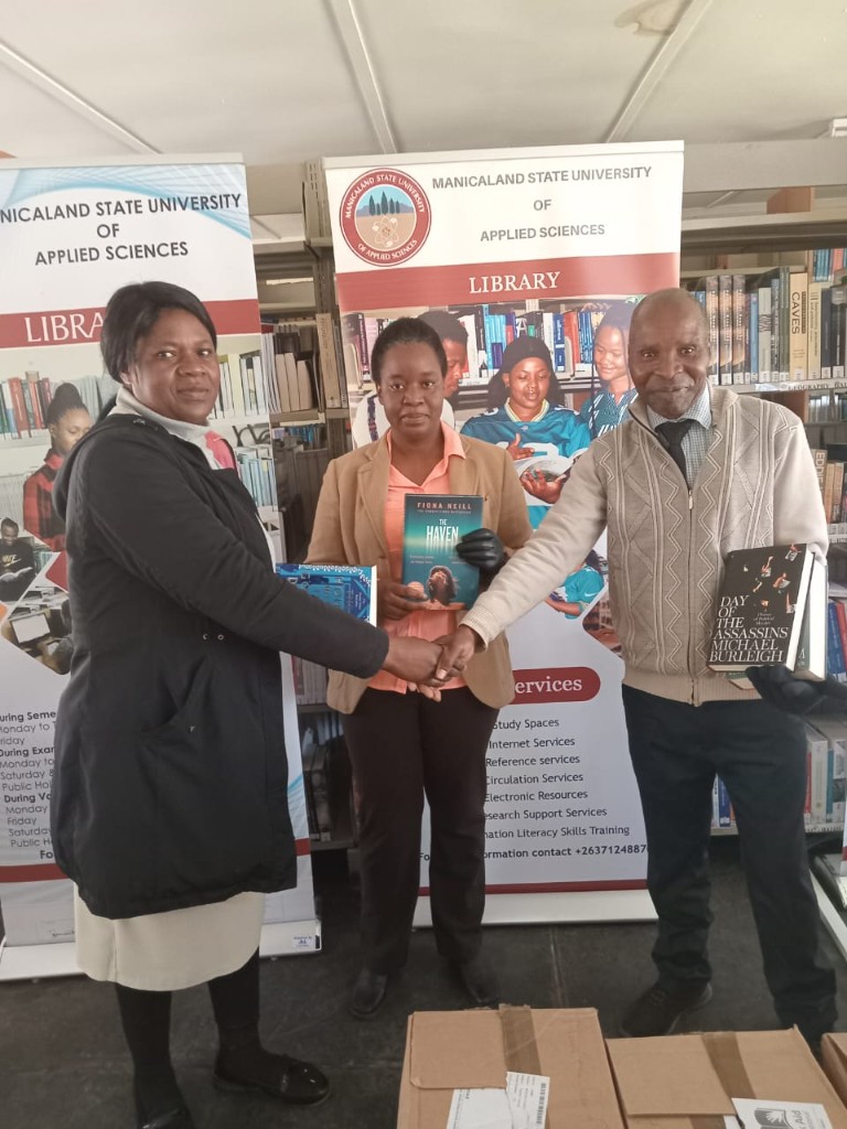 Book donation handover at MSUAS Library